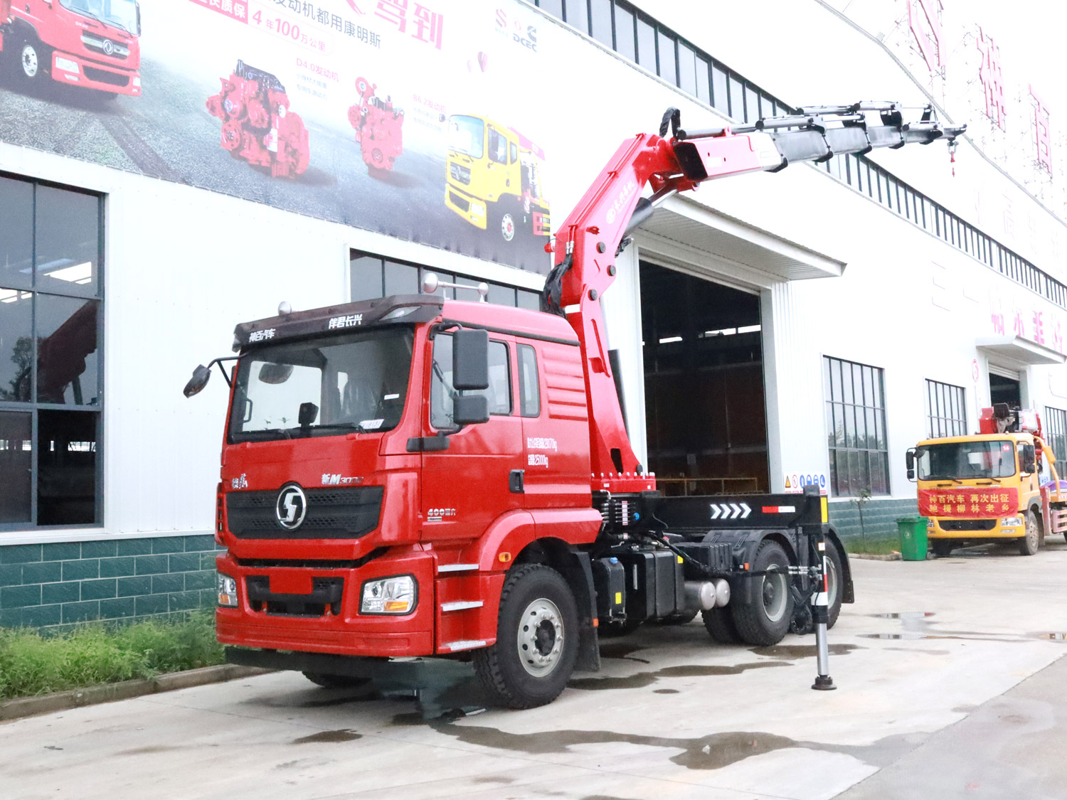 陜汽德龍新M3000牽引頭上裝長興20噸折臂式吊機(jī)