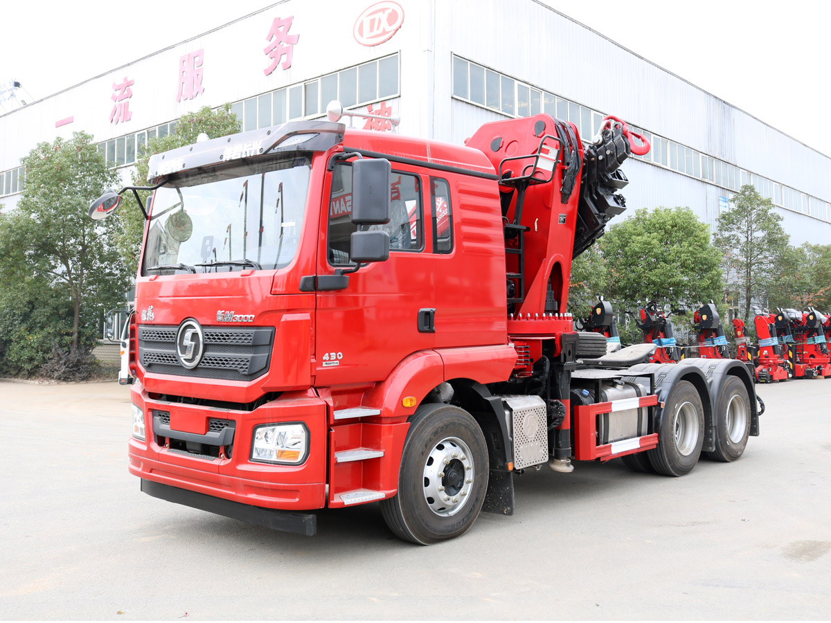 陜汽德龍新M3000牽引頭上裝長興40噸折臂式吊機(jī)